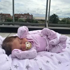 ADFO Reborn Baby Dolls 20 Inches Girl Realistic Baby Doll with Soft Cloth Body Purple Sleeping Lifelike Baby Doll with Feeding Accessories for Kids Ages 3 