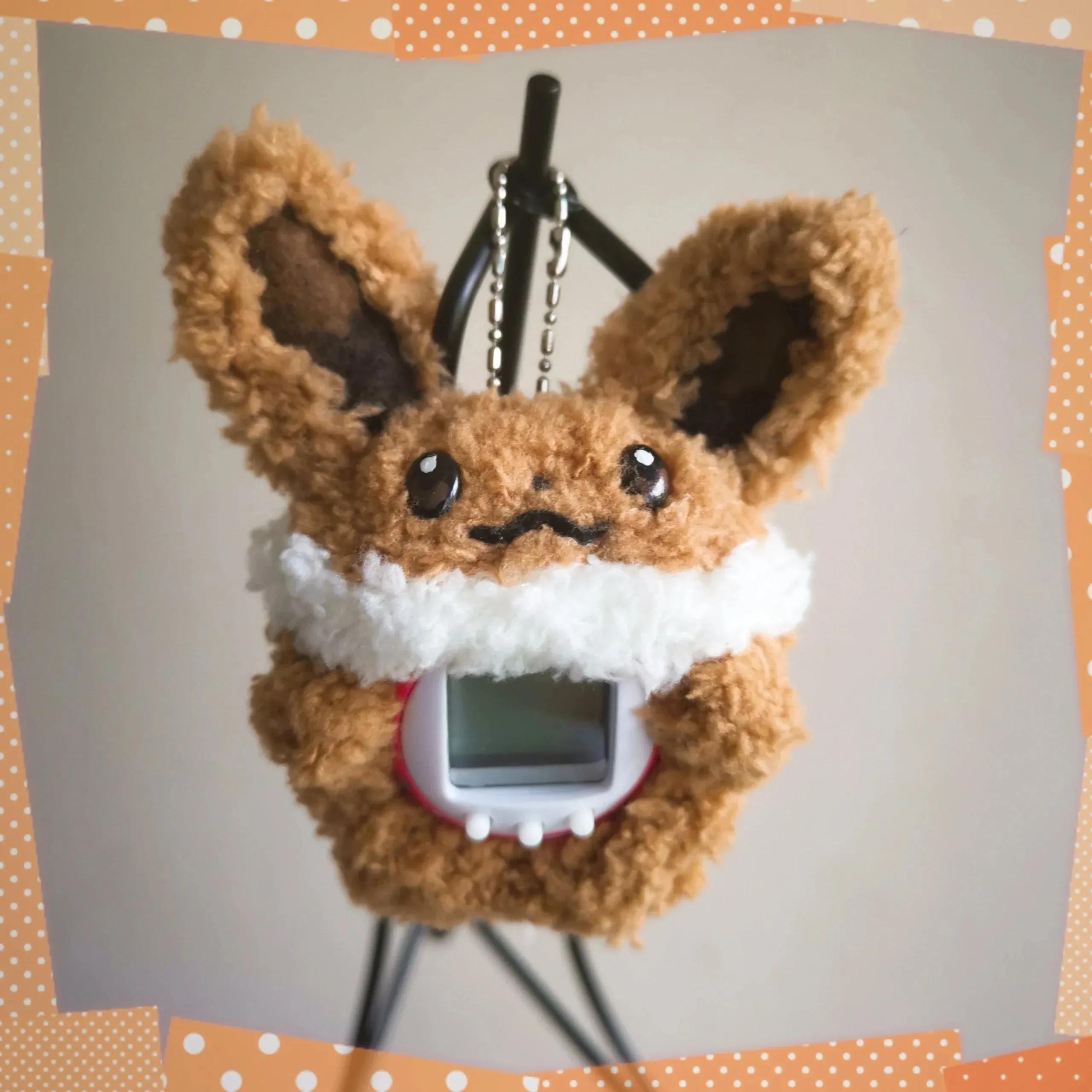 Eevee Fuzzy Tamagotchi Cover