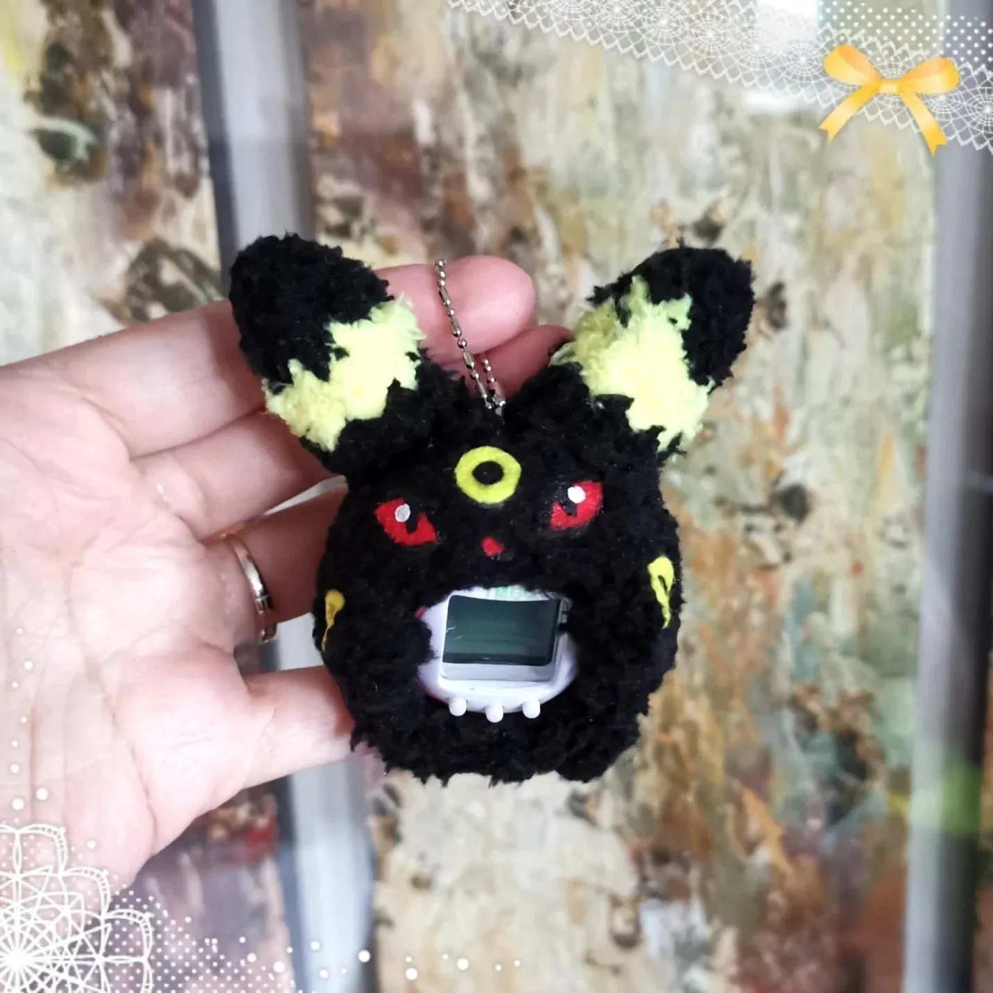 Umbreon Fuzzy Tamagotchi Cover